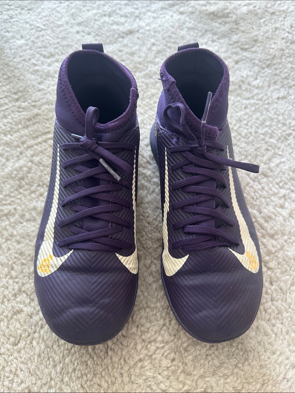 Nike kids Purple Athletic Cleats with White Swoosh